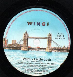 WINGS , WITH A LITTLE LUCK / BACKWARDS TRAVELLER/CUFF LINK
