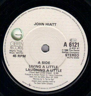 JOHN HIATT, LIVING A LITTLE LAUGHING A LITTLE / I'M A REAL MAN 
