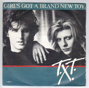 T.X.T., GIRLS GOT A BRAND NEW TOY / HOT WAS THE RAINY NIGHT